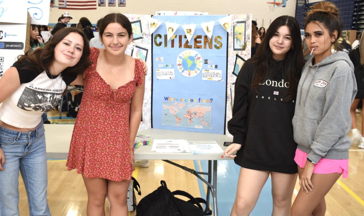 Grace Singh, Melissa Piedade, Siena Sun and Rachel Ramsey pose for the World Citizens Club.