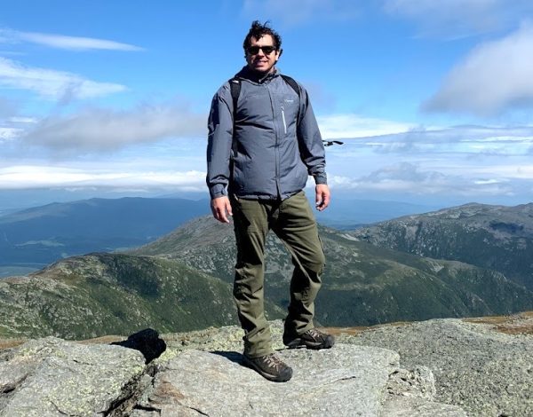 Assistant Principal Jeremy Cortash stands at the top of Mount Washington in New Hampshire.  Photo provided by  Cortash.