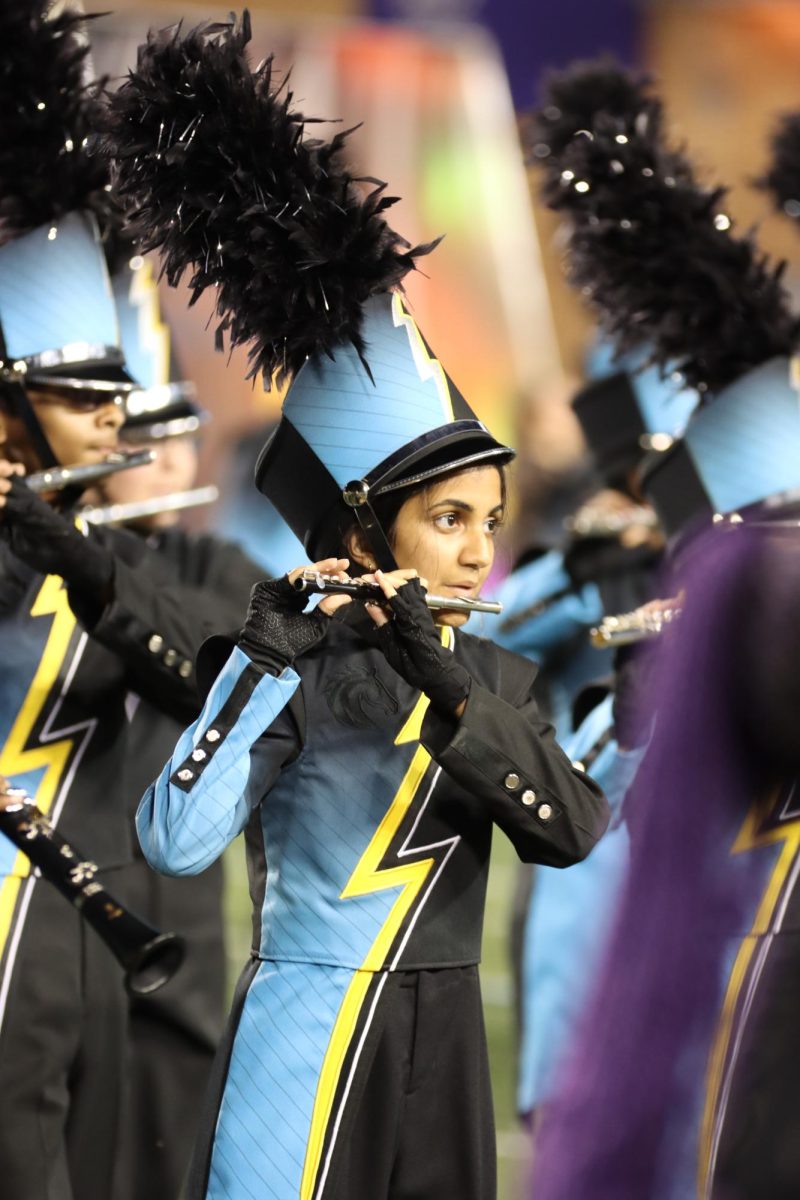 Senior Maya Tawney  performs at the Parade of Champions at James Madison University.  Photo courtesy of the Marching Storm and Jay Bradshaw.