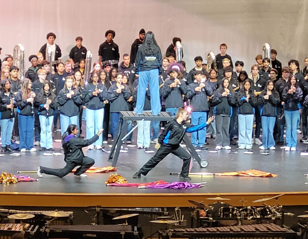The Marching Storm perform at the ceremony inviting them to perform in a parade in London, England on New Year's Day, 2027.