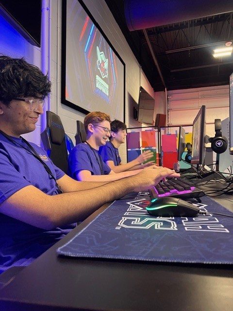Ayman Bashir, Ian Parker and Owen Clarke compete against other schools in League of Legends.  Photo courtesy of Greg Zawtowski.