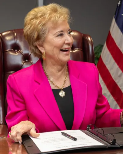The federal Department of Education, under the leadership of Secretary Linda McMahon (above), has pushed policies that penalize local districts for not reporting the citizenship status of students.  Phot courtesy of the United States Department of Education.