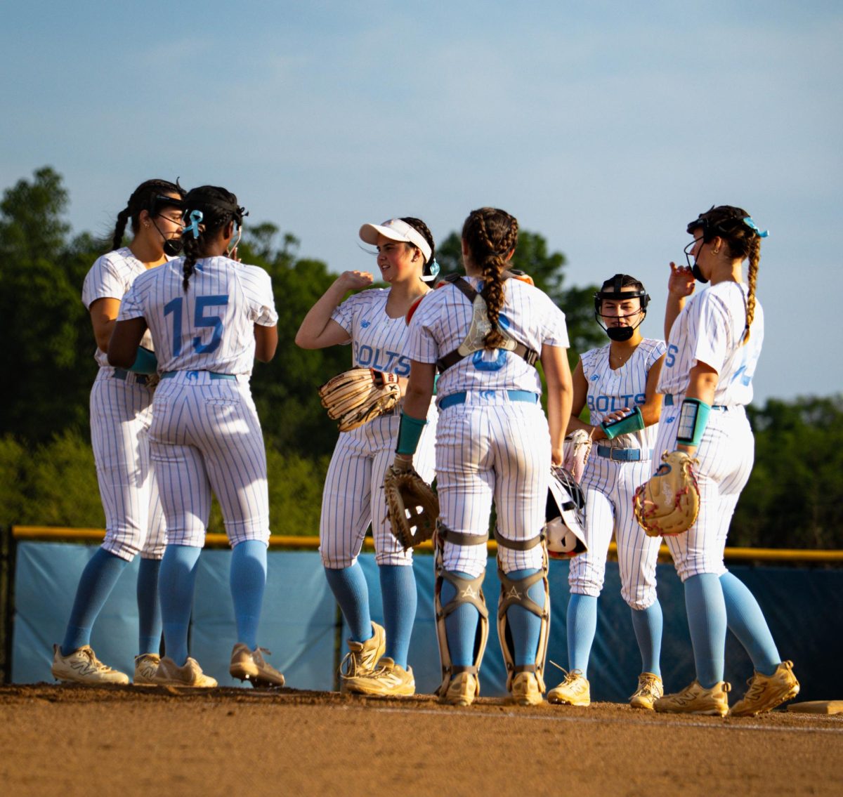 The team celebrates their victory over Riverside on May 5.